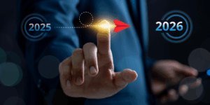 Koncepcja przejścia z jednego roku (2025) w kolejny (2026) i planowania przyszłości, pokazująca palec uruchamiający czerwoną strzałę w kierunku celu, reprezentujący przywództwo, kierunek i strategiczną mapę drogową sukcesu