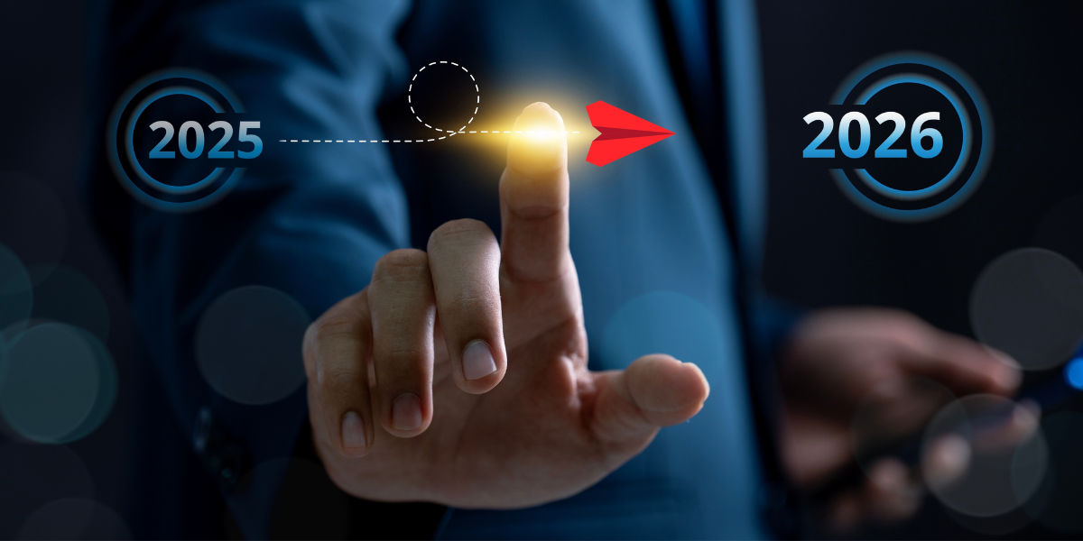 Koncepcja przejścia z jednego roku (2025) w kolejny (2026) i planowania przyszłości, pokazująca palec uruchamiający czerwoną strzałę w kierunku celu, reprezentujący przywództwo, kierunek i strategiczną mapę drogową sukcesu